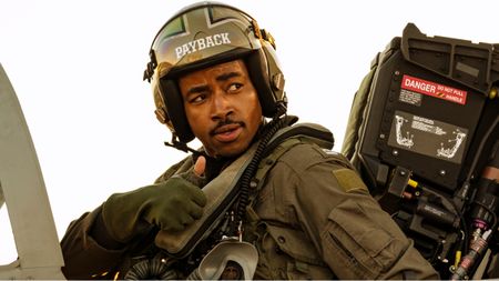 Jay Ellis sits in his cockpit before takeoff in Top Gun: Maverick.