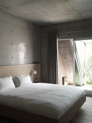 Concrete grey bedroom