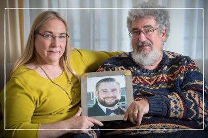 a close up of Seth Rich's parents holding a picture of their son in a frame