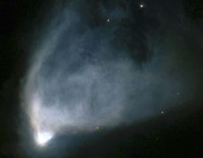 A strange "faster-than-light" experiment could help astronomers study distant objects like NGC 2261, a fan-shaped cloud of gas and dust that is illuminated by a star at its base.