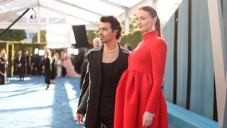Joe Jonas and Sophie Turner pose together at the 2022 Vanity Fair Oscar party