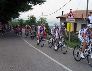 Riders approach the GPM on the second passage over the Castelnuovo climb.