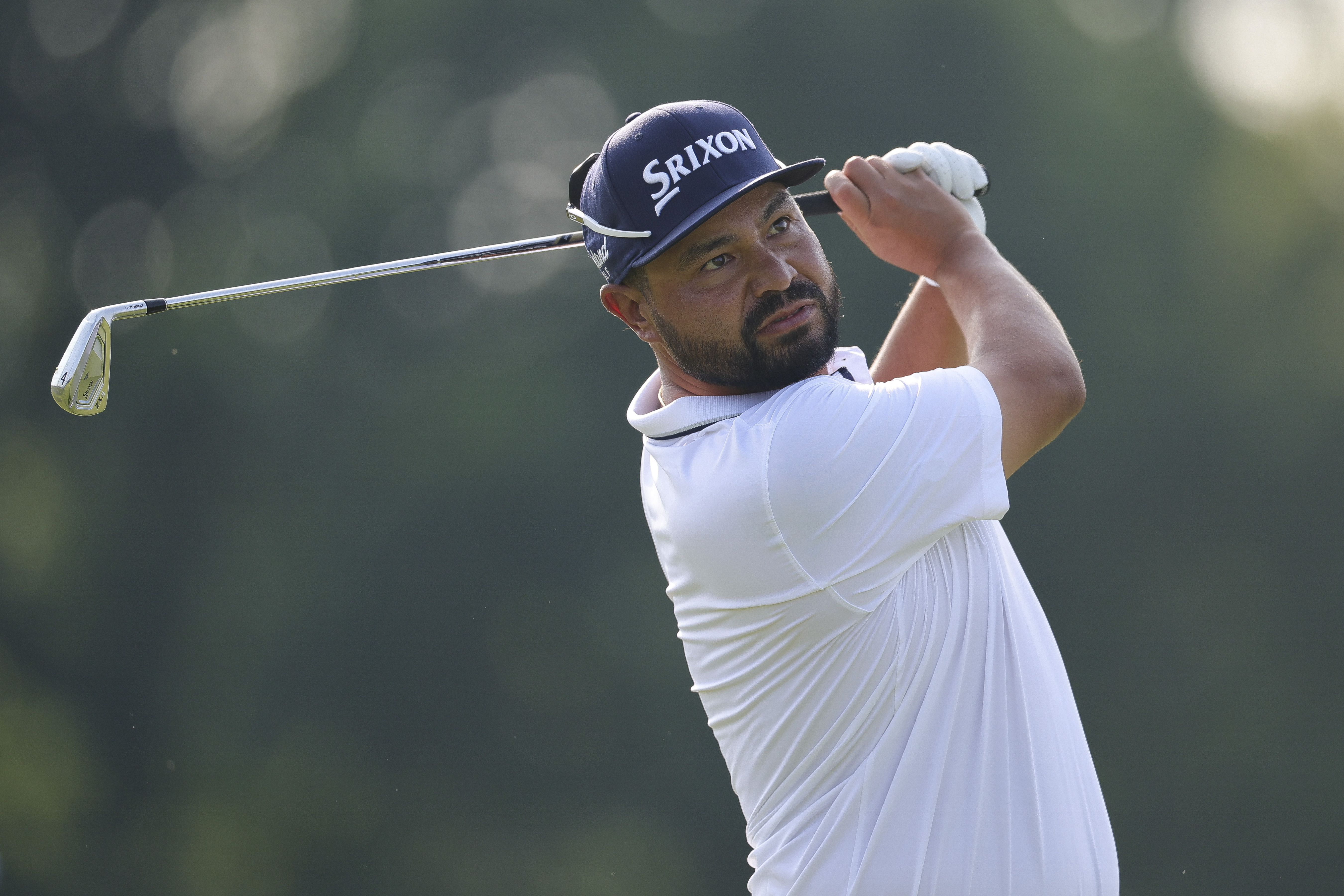 J.J. Spaun hits an iron off the tee
