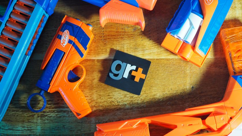 The GamesRadar+ logo surrounded by Nerf blasters on a wooden table