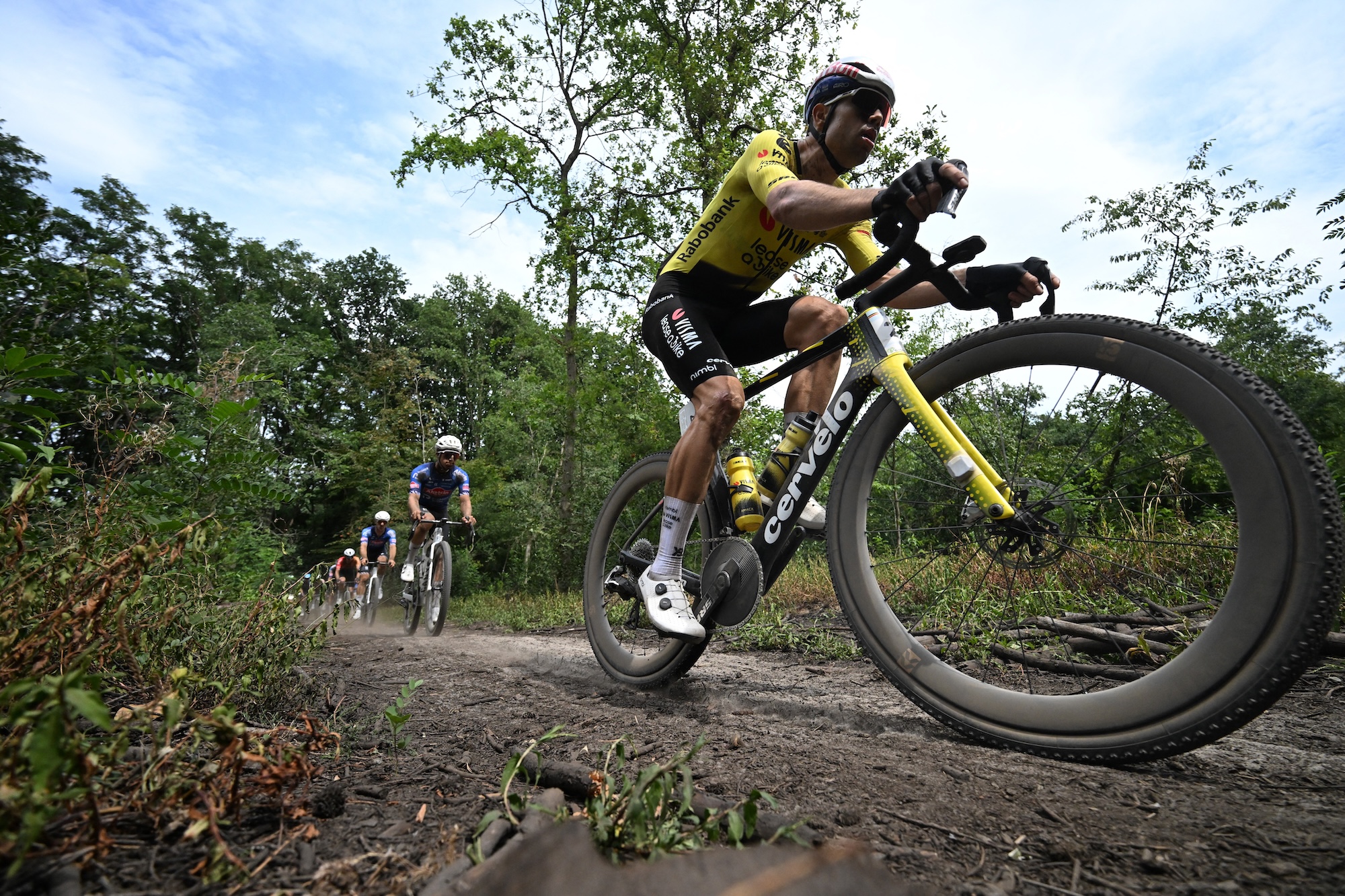 Team Visma-Lease a Bike's Belgian rider Wout van Aert competes in the men's elite race of the Belgian Gravel Championships in Grobbendonk on August 16, 2026. (Photo by ELIAS ROM / Belga / AFP) / Belgium OUT