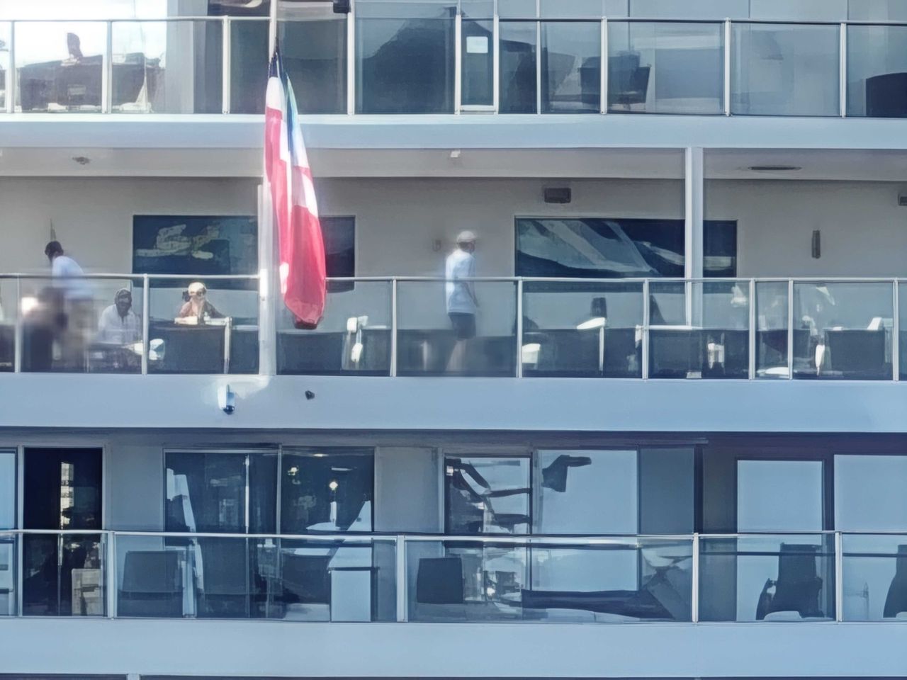 People walking along on a cruise ship