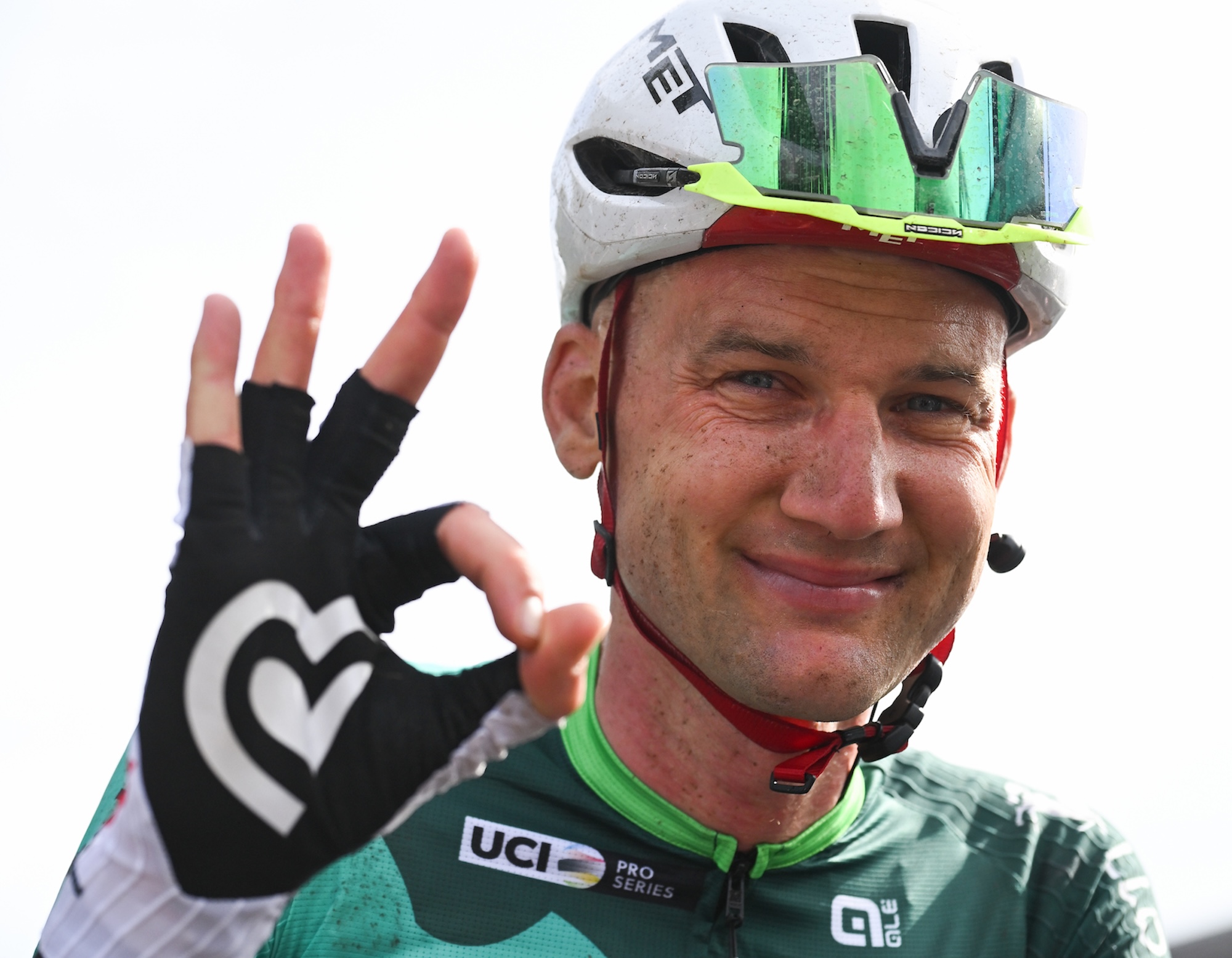 Tim Wellens heads to the podium as the GC champion
