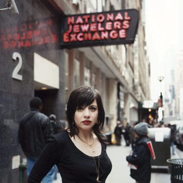 wendy brandes wearing necklaces she designed in the diamond district of new york city