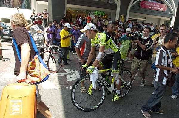 A patched up Andrea Guardini (Farnese Vini) makes his way to the presentations in Melaka after his stage victory.