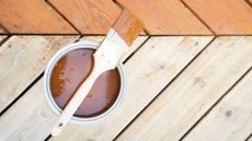 Paint and paintbrush for hardwood patio deck - for article on 'how to paint wood floors'