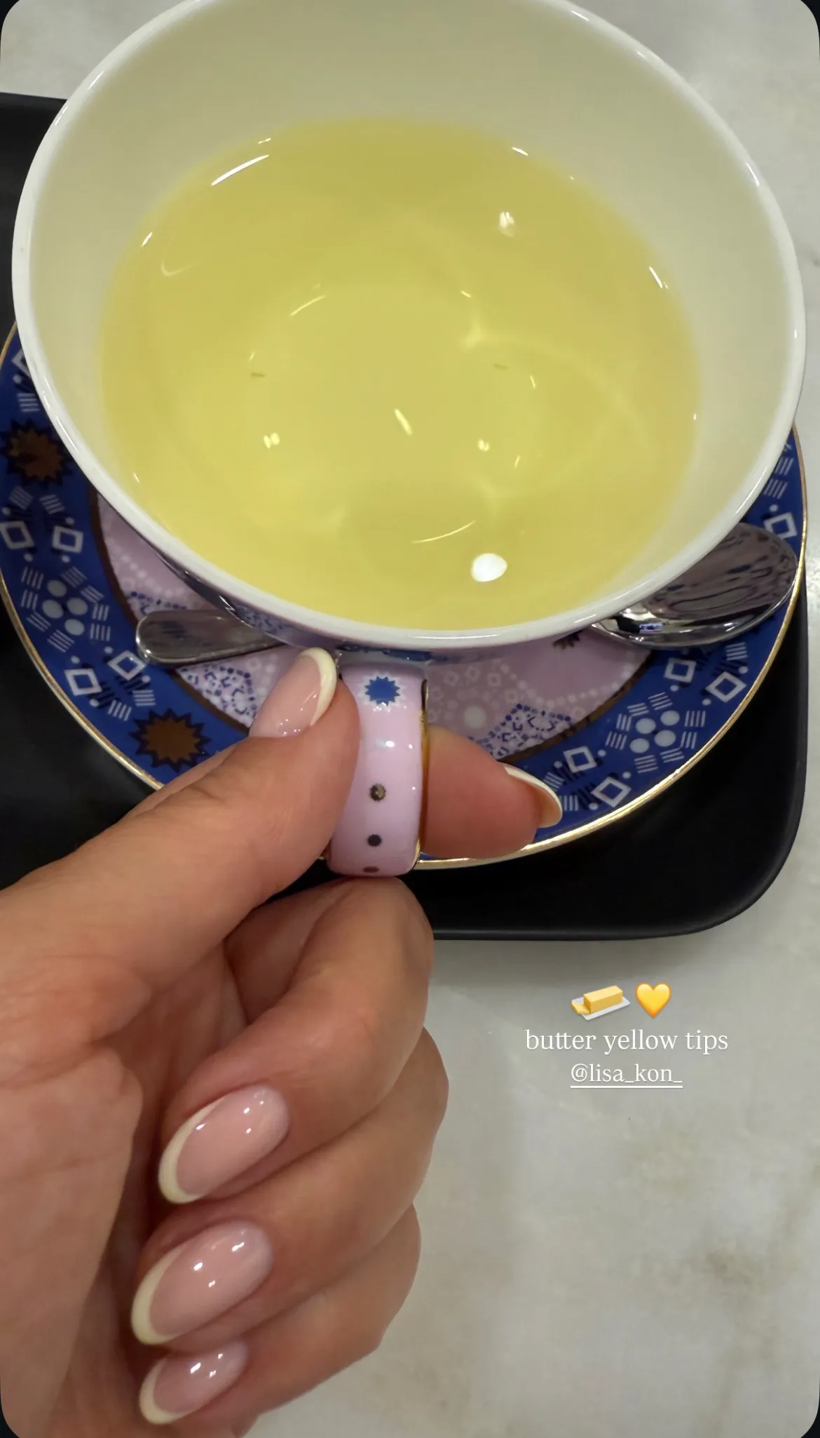 Kourtney Kardashian's Instagram Story showing her yellow French tips