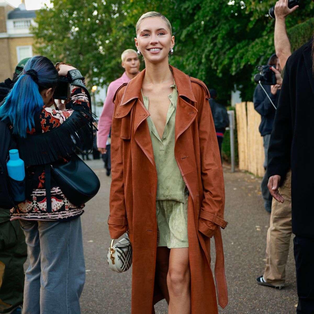 An image of Iris Law wearing one of the Burberry Trench coats
