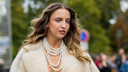 woman wearing pearl necklace