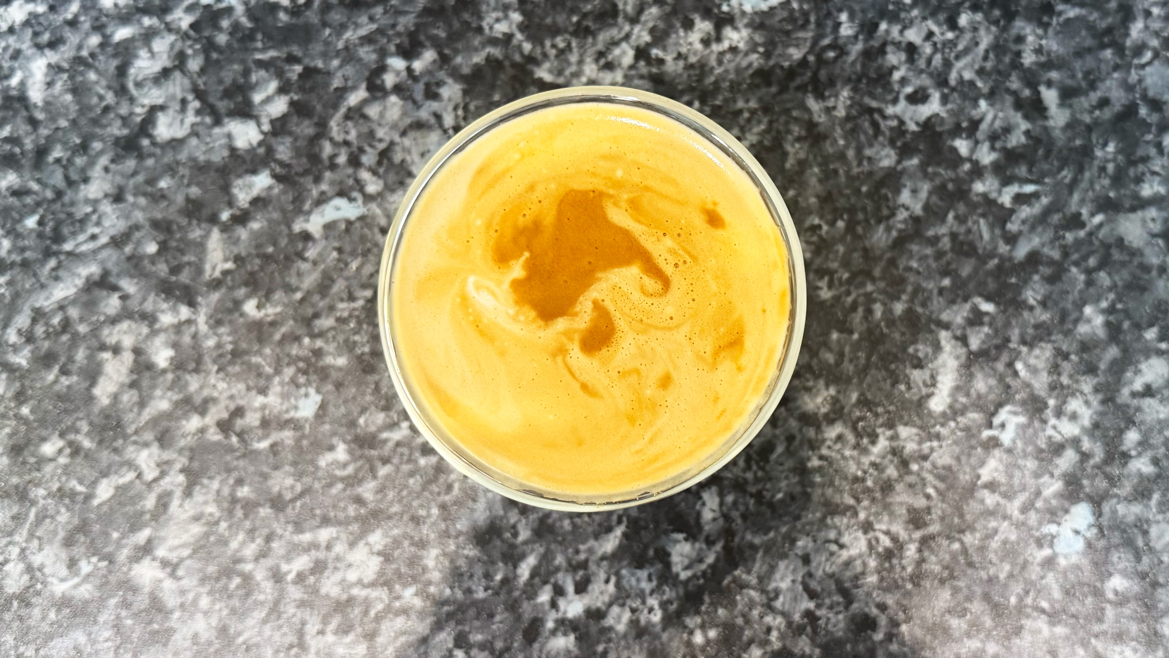 a picture of a latte made on the de'longhi la specialista opera following chatgpt's instructions