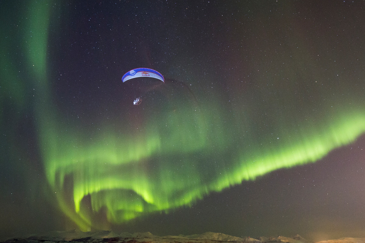 Paraglider Llorens with Northern Lights