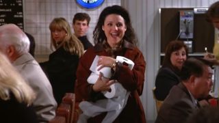 Elaine and the toilet paper from Seinfeld episode "The Stall"