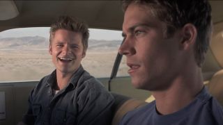 Steve Zahn laughs with a stunned Paul Walker in Joy Ride.