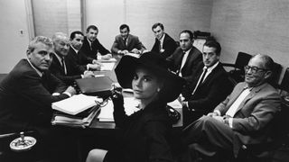 natalie wood sits in a business meeting