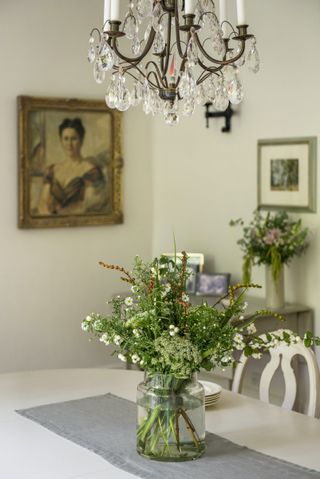 crystal chandelier in country room scheme