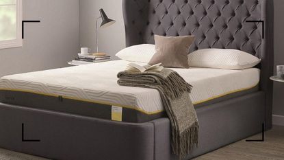 A Tempur Sensation Elite mattress in a gray modern bedroom, set up for a Tempur mattress review