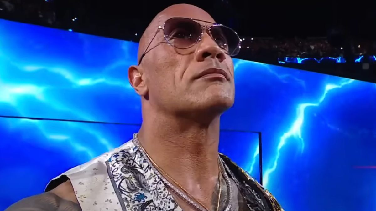 Dwayne Johnson arriving at the end of the Bad Blood PLE to stare down Cody Rhodes and Roman Reigns