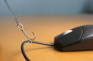 Mouse with fish hook attached to wire