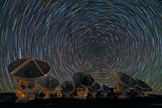 The antennas of the Atacama Large Millimeter/submillimeter Array (ALMA) shine under the southern sky. Image released Dec. 31, 2012.