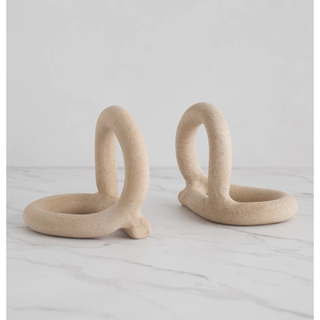 stoneware bookends with a looped design