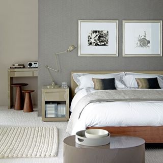 bedroom with grey wall and bed