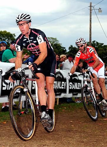 Jonathan Page (Planet Bike) at the barriers with Kabush close behind.