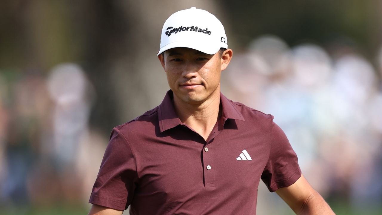 Collin Morikawa during The Players Championship wearing a maroon polo and white cap