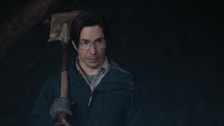 Mr Bratt (Justin Long) holding a shovel in the Goosebumps episode "Night of the Living Dummy: Part 2"