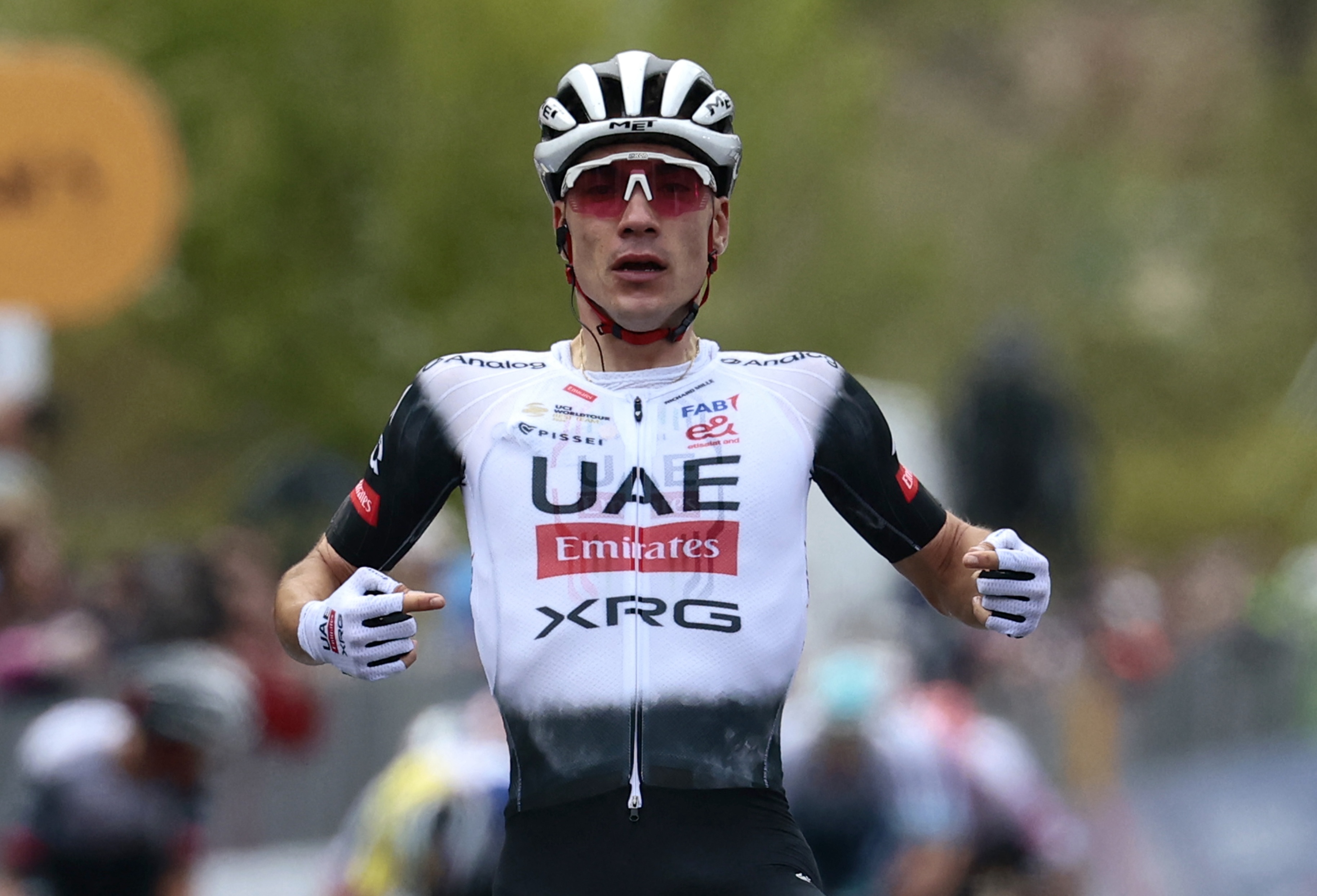 Juan Ayuso celebrates for his UAE Team Emirates-XRG squad as he crosses the Giro d&#039;Italia stage 7 finish with his first Grand Tour stage victory