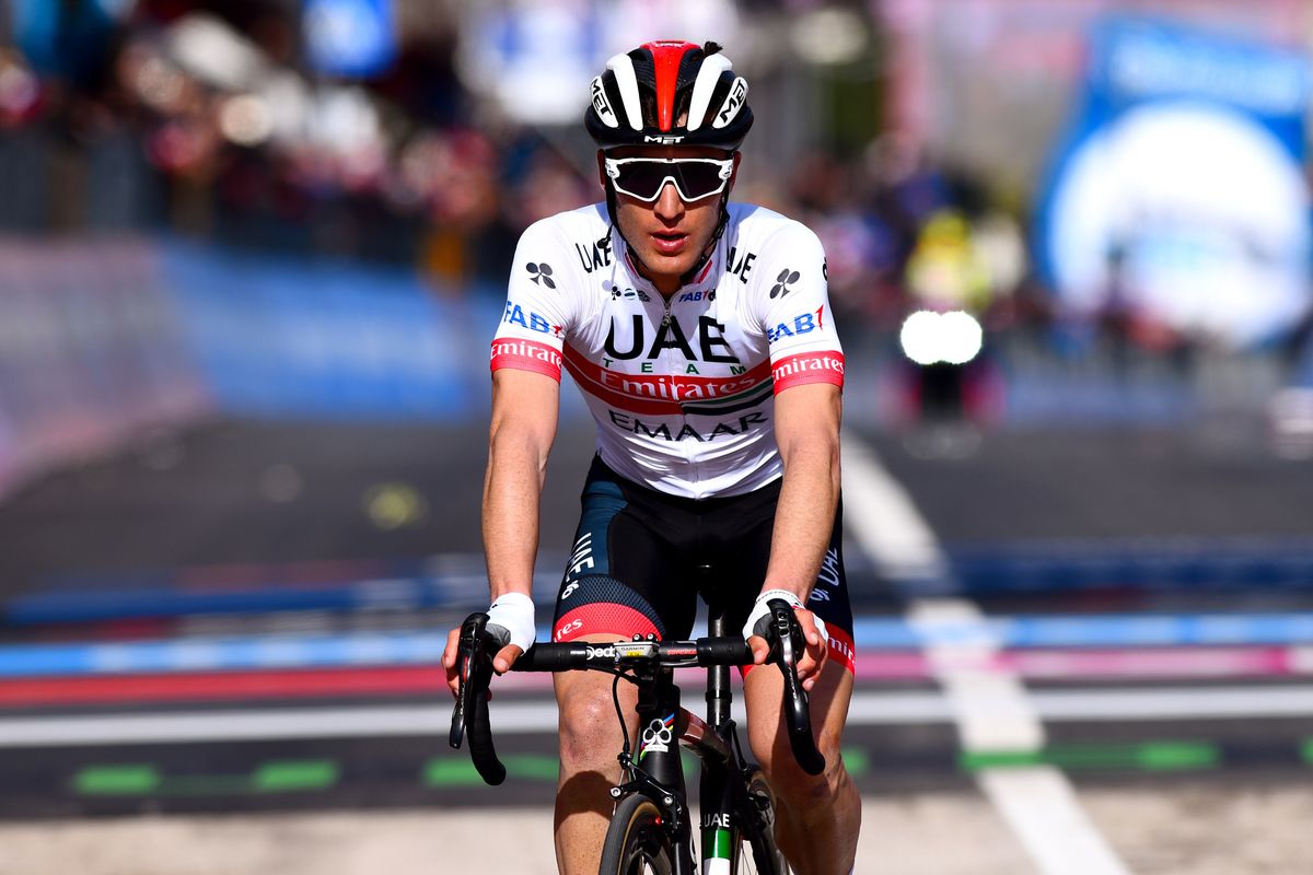 Valerio Conti (UAE Team Emirates) crosses the line as the new GC leader