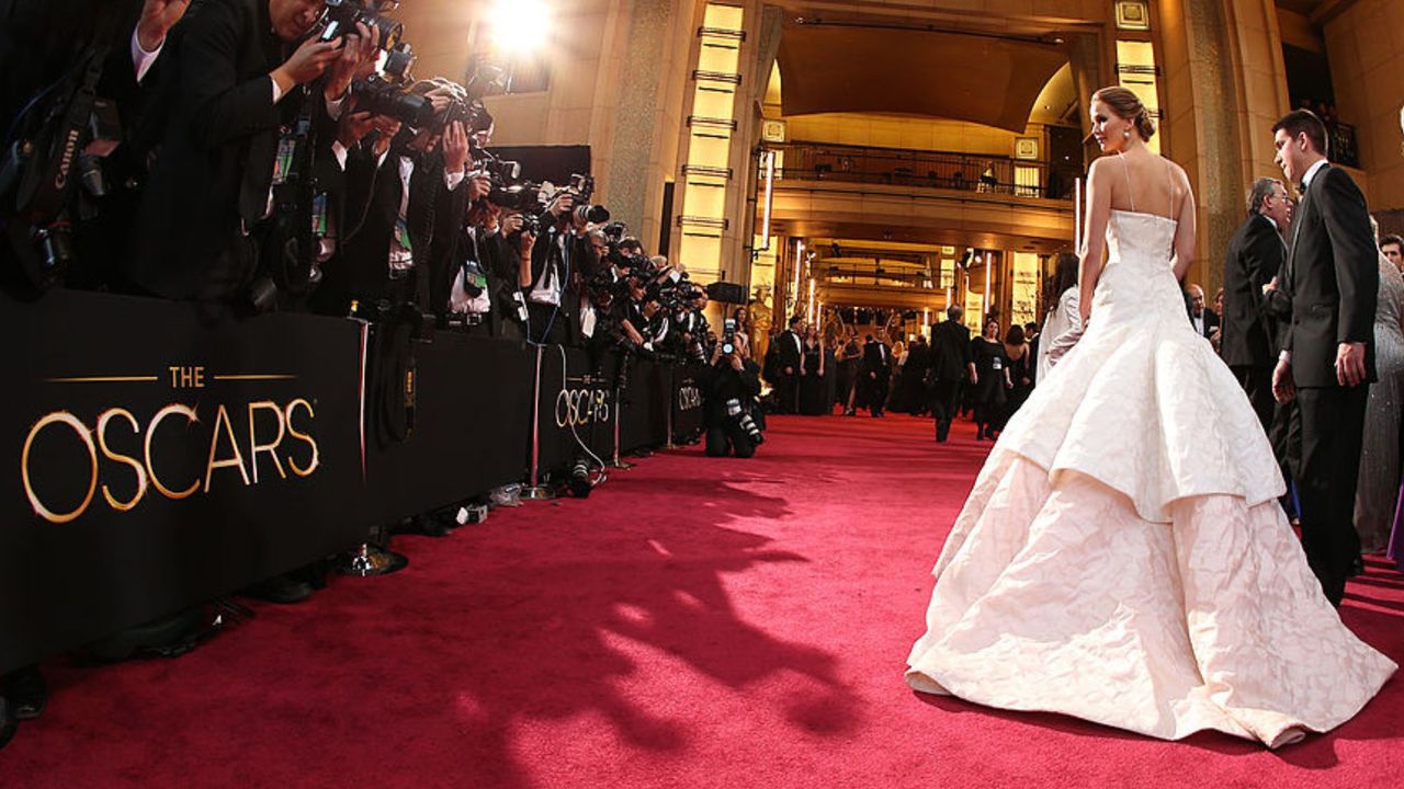 Jennifer Lawrence in a white dior dress at the oscars 2013 - the most expensive dress ever worn at the Oscars