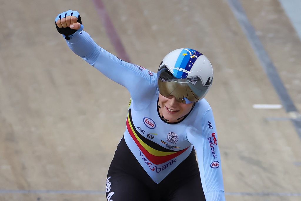 Belgiums Lotte Kopecky celebrates winning the Womens Elimination finals during the UCI Track Cycling World Championships at the Velodrome of SaintQuentinenYvelines southwest of Paris on October 13 2022 Photo by Thomas SAMSON AFP Photo by THOMAS SAMSONAFP via Getty Images