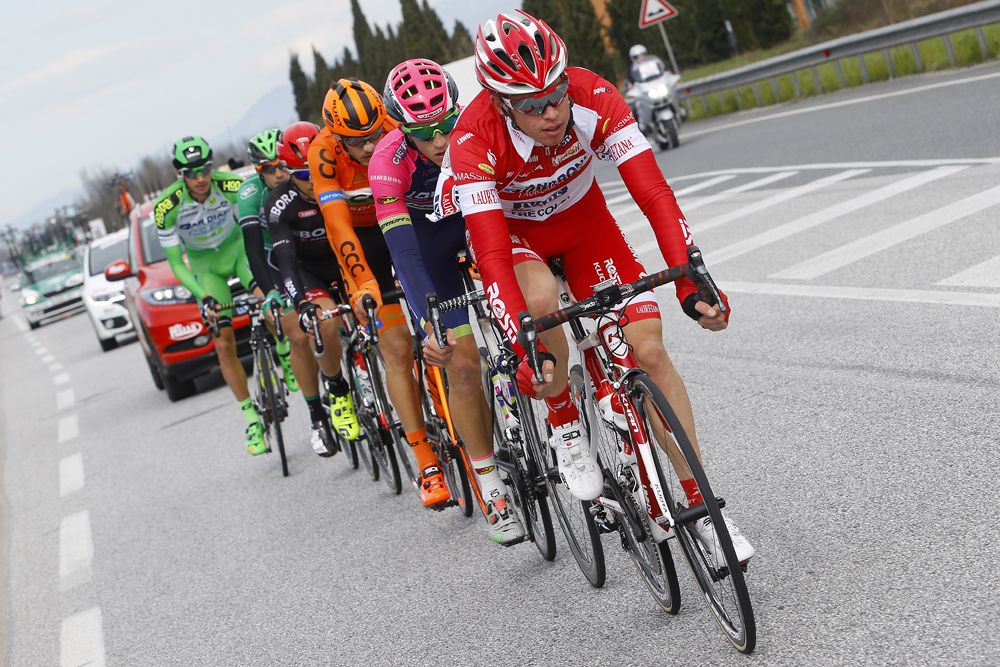 The breakaway riders plough on