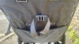 a photo of the newborn nest straps on the Ergobaby Metro+ Deluxe Stroller