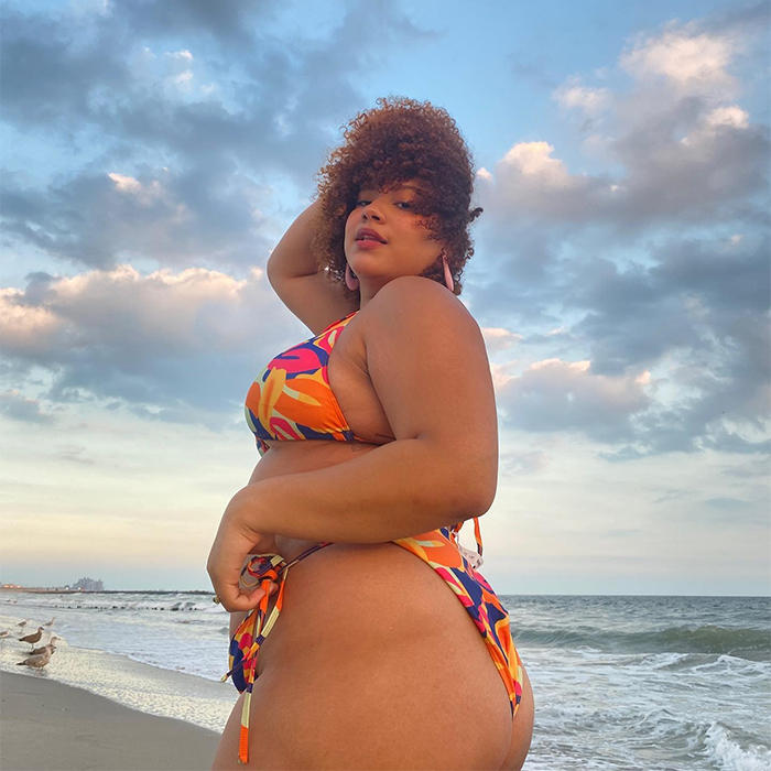 ana wears multi colored bikini on a beach