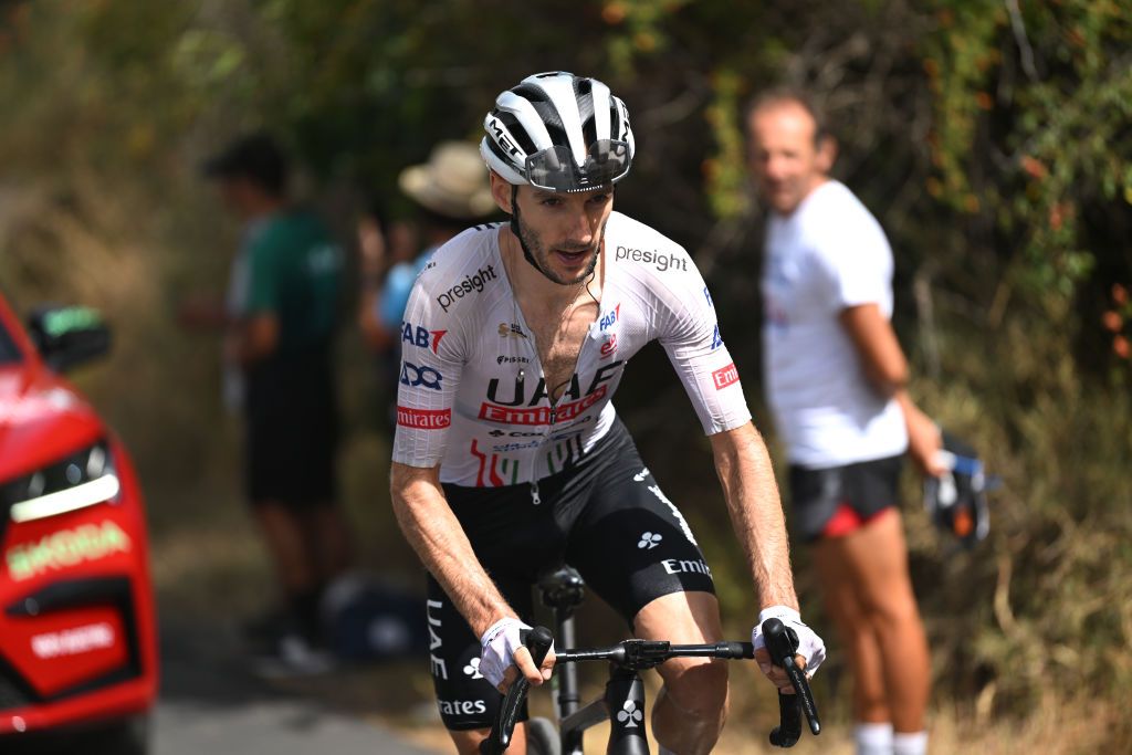 GRANADA SPAIN AUGUST 25 Adam Yates of The United Kingdom and UAE Team Emirates competes in the breakaway during the La Vuelta 79th Tour of Spain 2024 Stage 9 a 1785km stage from Motril to Granada UCIWT on August 25 2024 in Granada Spain Photo by Dario BelingheriGetty Images