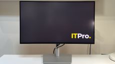 The Dell UltraSharp U2725QE monitor on a desk