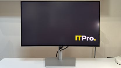 The Dell UltraSharp U2725QE monitor on a desk