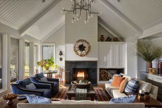 A living room with a snug fireplace