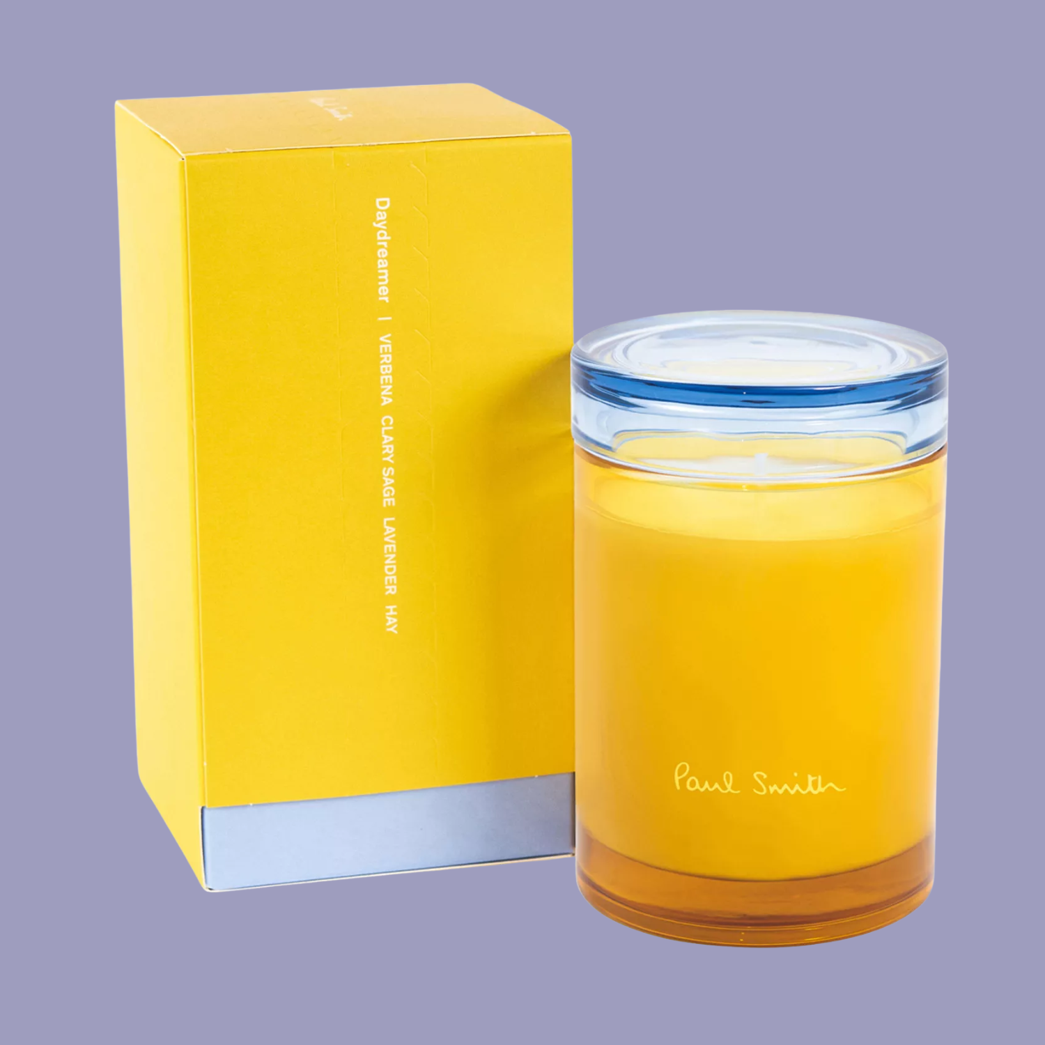 A yellow candle with a light blue glass lid