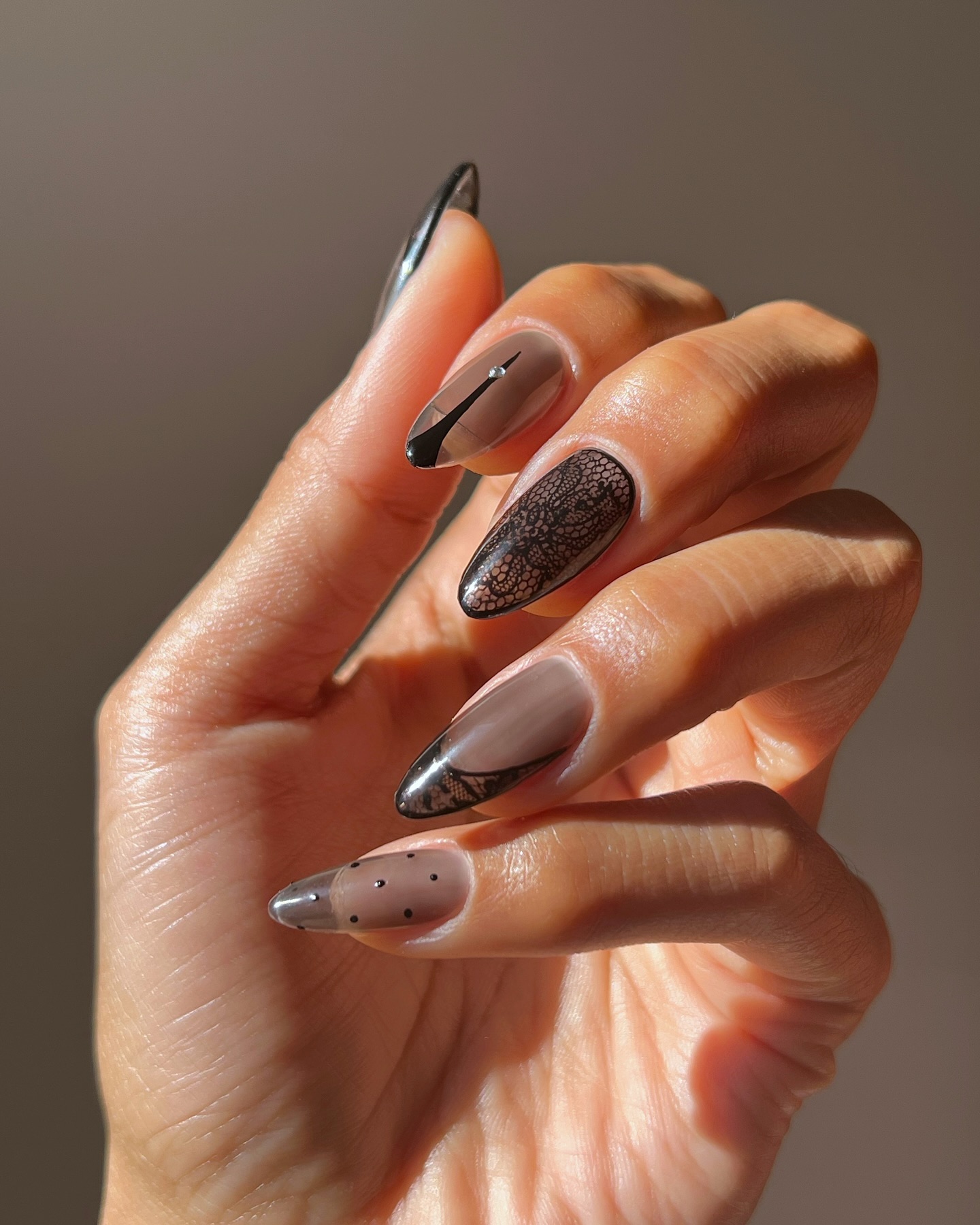 Sheer lace black nail art by @overglowedit