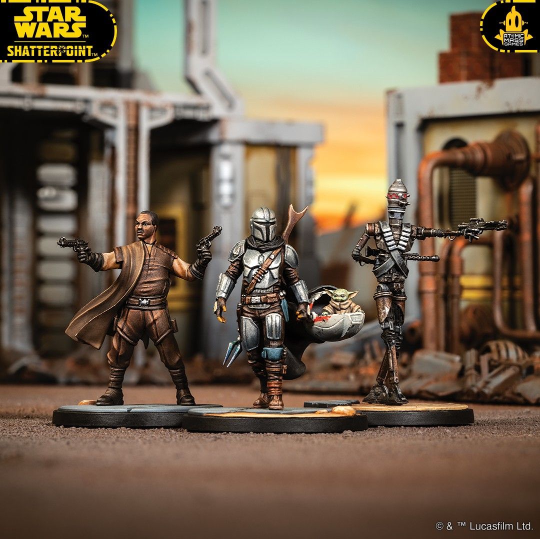 Models of Greef Karga, The Mandalorian, Grogu, and IG-11 on a Star Wars: Shatterpoint battlefield