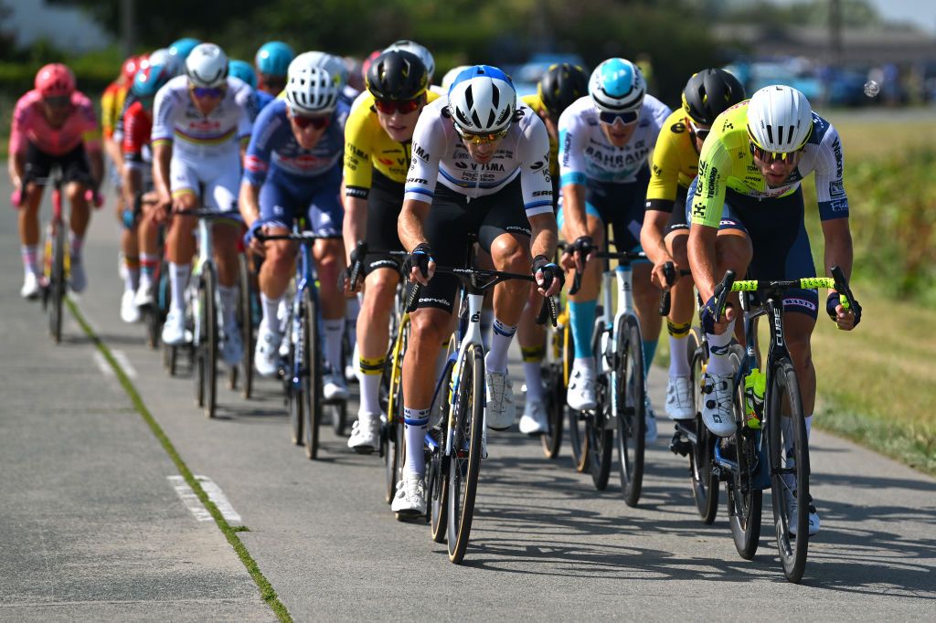 AALTER BELGIUM AUGUST 31 LR Christophe Laporte of France and Team Visma Lease A Bike and Laurenz Rex of Belgium and Team Intermarche Wanty compete during the 20th Renewi Tour 2024 Stage 4 a 1785km stage from Oostburg to Aalter UCIWT on August 31 2024 in Aalter Belgium Photo by Luc ClaessenGetty Images
