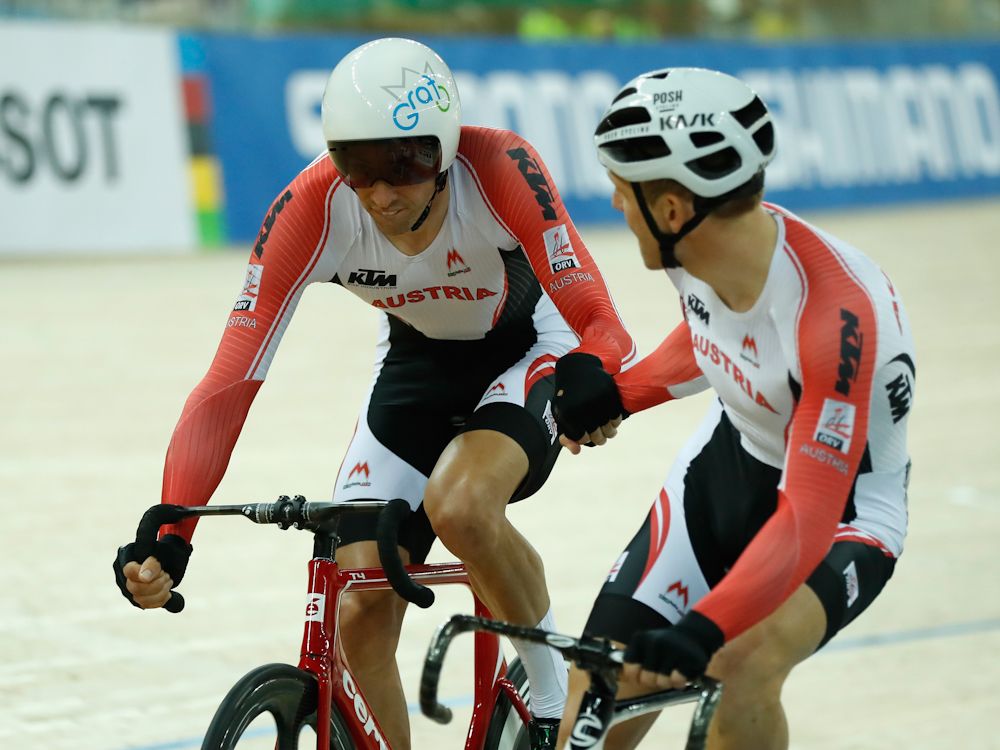Team of Austria's Andreas Muller and Andreas Graf in relay of the Men's Madison Final on Day 5 in 2017 UCI Track Cycling World Championships