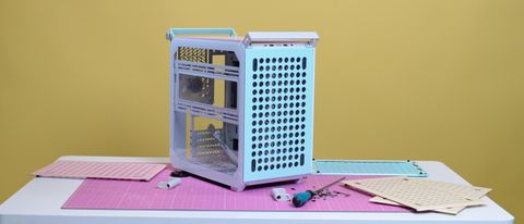 A Cooler Master Qube 500 PC case on a desk