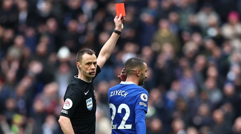 Chelsea&#039;s Hakim Ziyech is shown a red card in the Blues&#039; Premier League game at Tottenham, but it is changed to a yellow following a VAR check.